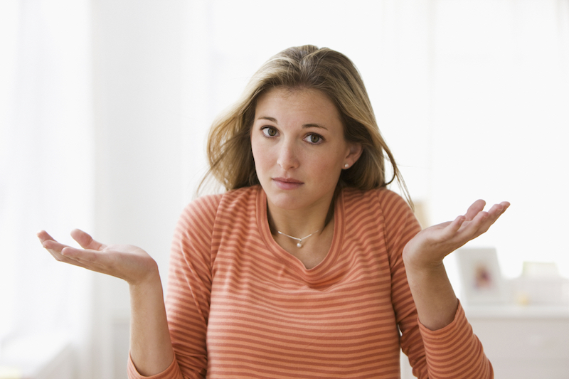 Confused young caucasian woman, horizontal composition